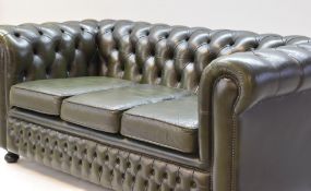 VICTORIAN-STYLE GREEN LEATHER CHESTERFIELD SOFA, button upholstered with three loose cushions, 78h x
