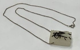 TORBEN HARDENBERG SCULPTURAL PENDANT NECKLACE - Fly on a sugar cube, circa 1970-80, sterling