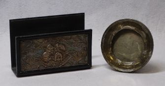 SILVER MOUNTED LETTER RACK and a circular portrait frame, the rack in leather covered metal with