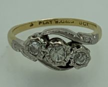 18CT GOLD & PLATINUM 3 STONE DIAMOND CROSSOVER RING, size M I-J, 3.2grms