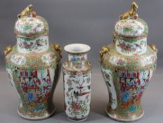LATE 19TH CENTURY CHINESE CANTON DECORATED JARS WITH COVERS and a vase (damages and restorations)