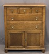 VINTAGE OAK TALLBOY - having three small drawers over two long drawers and twin lower cupboard