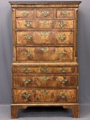 GEORGE III PERIOD WALNUT CHEST ON CHEST having a shaped cornice over an arrangement of three