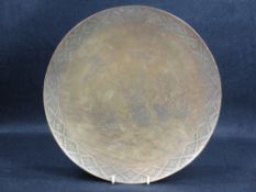 JAPANESE BRONZE DISH BY THE HAMADA STUDIO, decorated with four tsuru amongst reeds beside water,