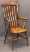 VICTORIAN FARMHOUSE ARMCHAIR - with shaped ribs to the back on turned arm and under tier supports,