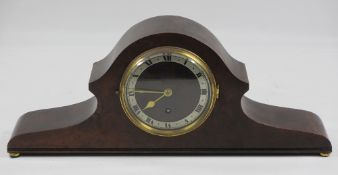 ANTIQUE WALNUT MANTEL CLOCK with Roman numeral dial and brass bezel, 17cms H, 42cms W, 8cms D