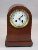 MAHOGANY DOME TOP CLOCK - movement by Samuel Marti, Paris 1900, glazed door to back