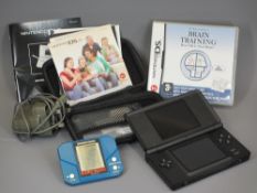 NINTENDO DS LITE with charger, carry case and instruction booklets and a Grandstand King Kong Jungle