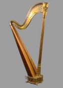 J C SCHWIESO & CO seven pedal patent gilt wood harp, Grecian style in satinwood and rosewood, the
