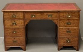 VICTORIAN MAHOGANY KNEEHOLE DESK having a tooled red leather insert to the top over twin banks of