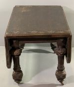 JACOBEAN STYLE CARVED OAK DINING TABLE, twin flap with fan detail to the outer edges, on substantial