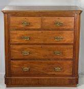 VICTORIAN MAHOGANY ROUNDED CORNER CHEST of two short over three long drawers, on a plinth base,