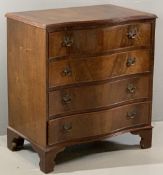 REPRODUCTION WALNUT SERPENTINE CHEST OF FOUR DRAWERS with fancy brass backplates and swing