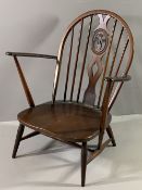 ERCOL STICKBACK ARMCHAIR with fleur de lys detail to the splatback (no cushions), 83cms H, 71cms