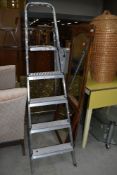 A set of aluminium step ladders