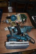 A selection of vintage electric hand tools including sander drill driver jigsaw etc