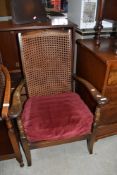 A traditional cane back armchair