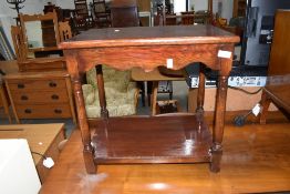 A traditional oak side table, being overstained, approx. 52 x 35cm