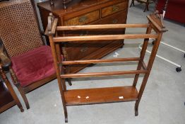 An early 20th Century mahogany and inlaid towel rail, probably Maple and Co, width approx. 73cm