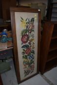 A large stained frame floral embroidery, dated en verso 1940, approx. 128 x 49cm