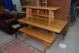 A modern pine refectory style kitchen table and pair of matching form benches, table approx. 150 x