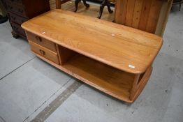 An Ercol coffee table, in the Minerva/Pandora style having double drawer base, dimensions approx.