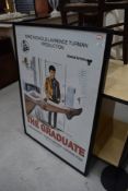 A framed reproduction film poster, The Graduate, approx. 104 x 73cm