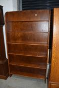 A stained bookshelf, approx. Width 97cm