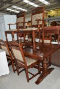 An Old Charm or similar refectory style dining table and six (four plus two) dining chairs