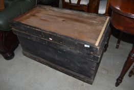 A traditional pine tool box , with mismatched lid