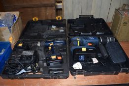 Two battery operated cordless drivers one large hammer drill and smaller screw driver
