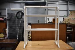 A traditional painted towel rail
