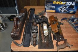 A selection of wood working tools including hand plane Spear and Jackson saw and large float
