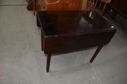 A 19th Century mahogany Pembroke style table, having frieze drawer and one dummy drawer, approx.