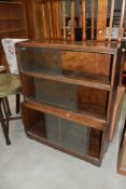 An early 20th Century oak stacking bookcase of three tiers, width approx. 89cm