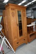 An Art Nouveau mirror door wardrobe of shallow proportions , dimensions approx. W101cm D38cm H194cm