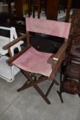 A folding canvas directors style chair