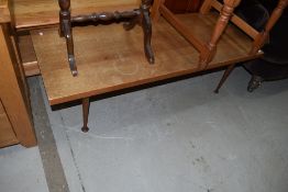 A vintage teak coffee table, approx. 117 x 46cm on wasted legs