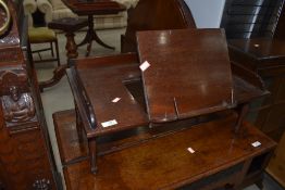 An early 20th Century mahogany bed table or table top music/book stand, ideal for recipe books or