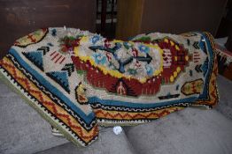 A vintage pegged style rug