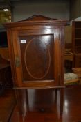 An early 20th Century mahogany and inlaid pot cupboard, probably Maple and Co, width approx. 41cm