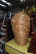 A traditional wicker work linen or snake charmers basket