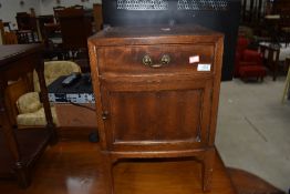 An early 20th Century bedside cabinet, height approx. 54cm
