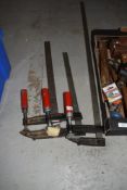 A selection of large clamps or grips