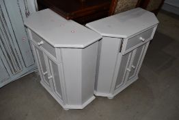 A pair of painted canted side cabinets, each width approx. 66cm