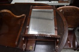 A 19th Century mahogany hall mirror, with shelf, fretwork decoration damaged