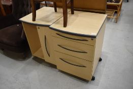 A pair of modern laminate office cabinets