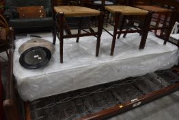 A single mattress, still sealed, deep type