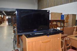 A Samsung 26' TV and DVD player/HDD recorder