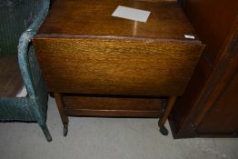 A traditional oak tea trolley, with drop flaps